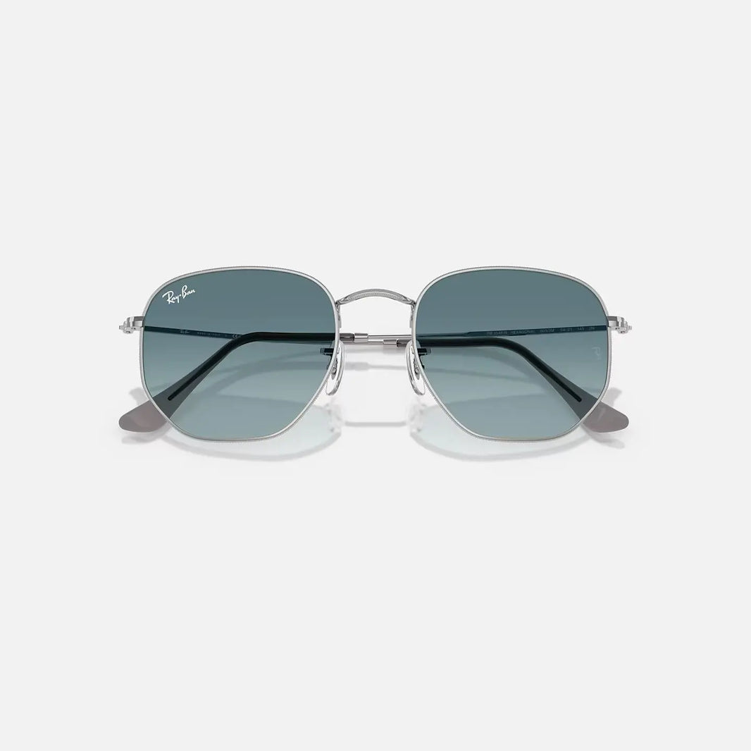 Ray-Ban Hexagonal RB 3548-N metal frame sunglasses with blue lenses and geometric hexagonal shape.