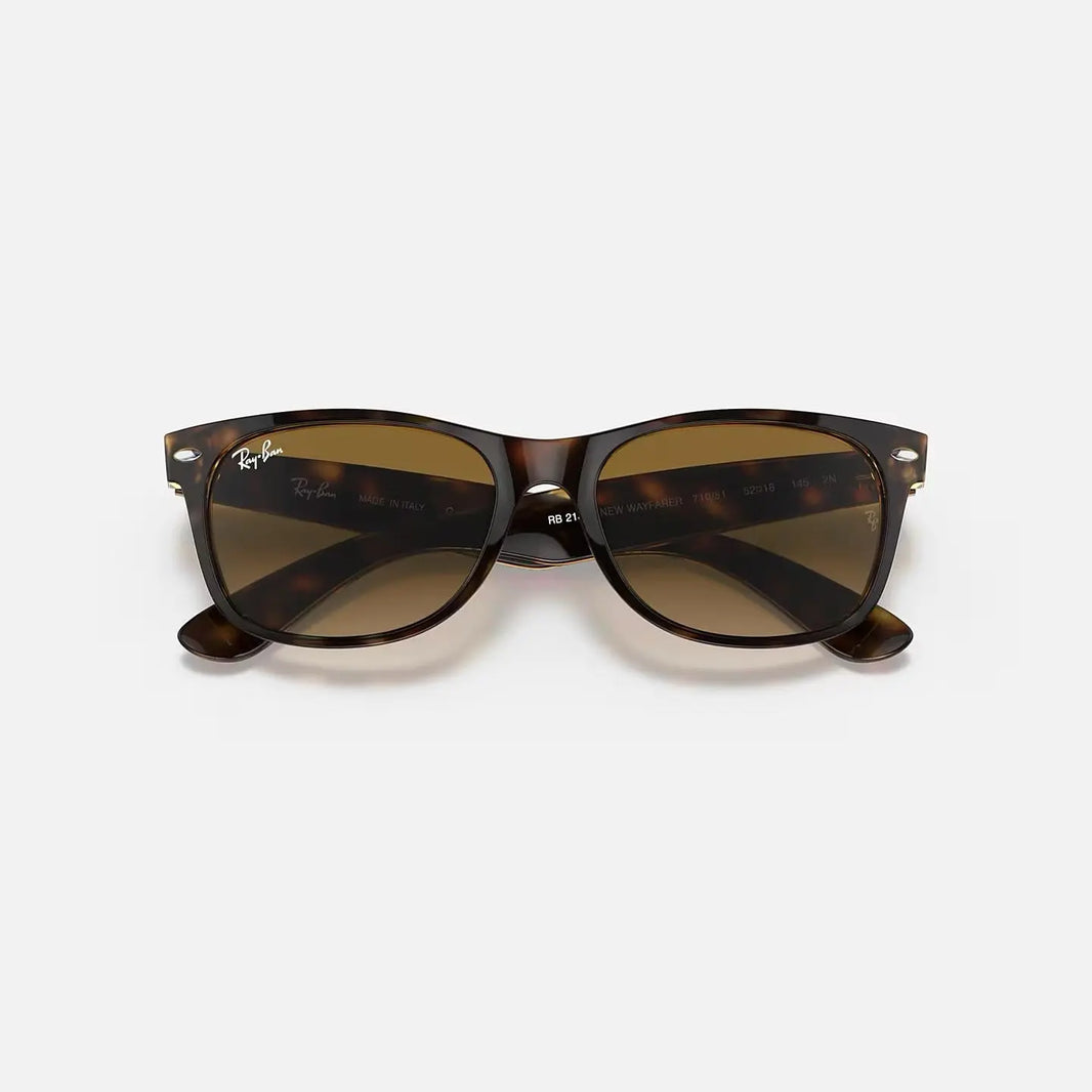 Ray-Ban New Wayfarer RB2132 sunglasses with glossy tortoiseshell frame and brown G-15 lenses, UV400 protection.
