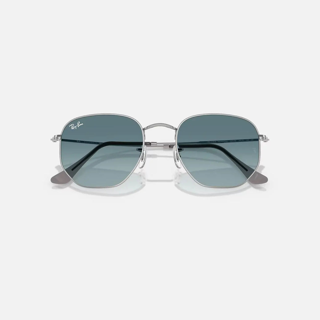 Ray-Ban Hexagonal RB 3548-N metal frame sunglasses with blue lenses and geometric hexagonal shape.