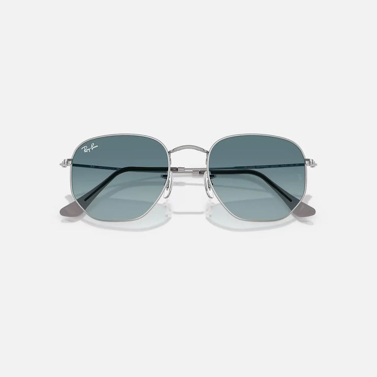 Ray-Ban Hexagonal RB 3548-N metal frame sunglasses with blue lenses and geometric hexagonal shape.