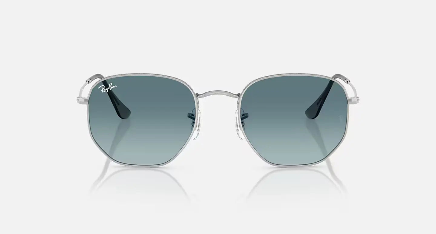 Ray-Ban Hexagonal RB 3548-N sunglasses with thin metal frame and green gradient lenses for stylish UV protection.
