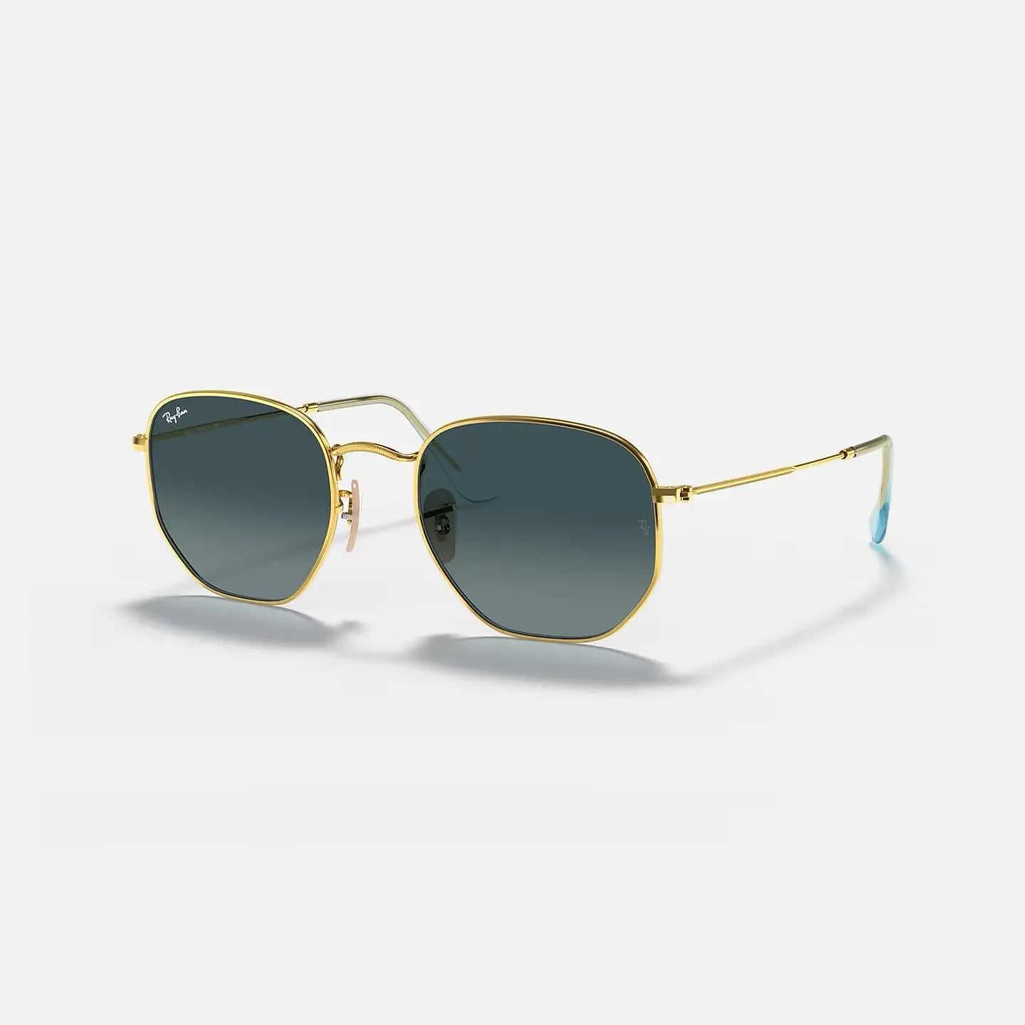 Ray-Ban Hexagonal RB 3548-N sunglasses with thin gold metal frame and green G-15 lenses, UV400 protection.