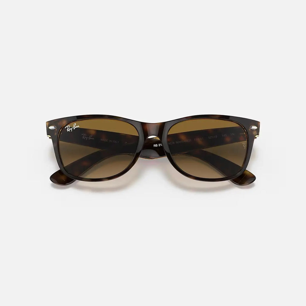 Ray-Ban New Wayfarer RB2132 sunglasses with glossy tortoiseshell frame and brown G-15 lenses, UV400 protection.